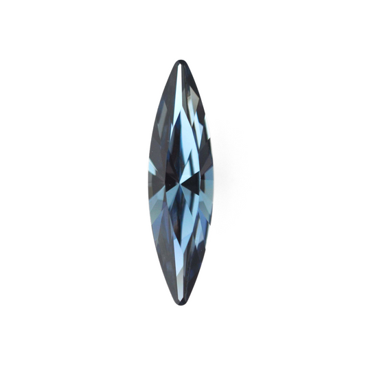 One large navette shape faceted Austrian crystal rhinestones in the color Denim Blue displayed on a white background.