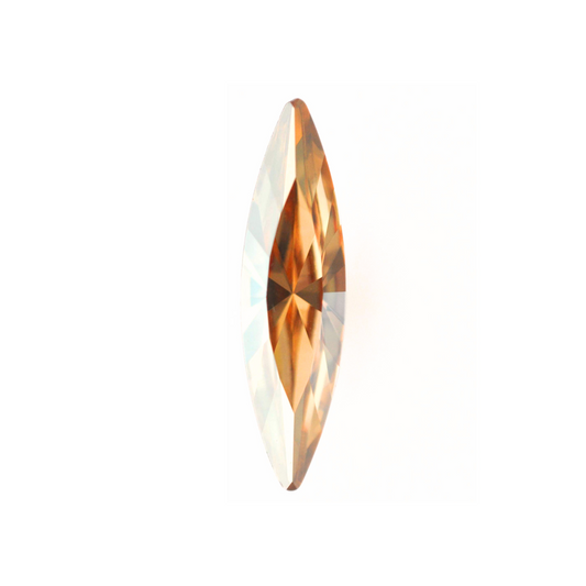 One large navette shape faceted Austrian crystal rhinestones in the color Golden Shadow displayed on a white background.