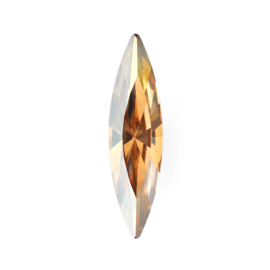 One large navette shape faceted Austrian crystal rhinestones in the color Golden Shadow displayed on a white background.