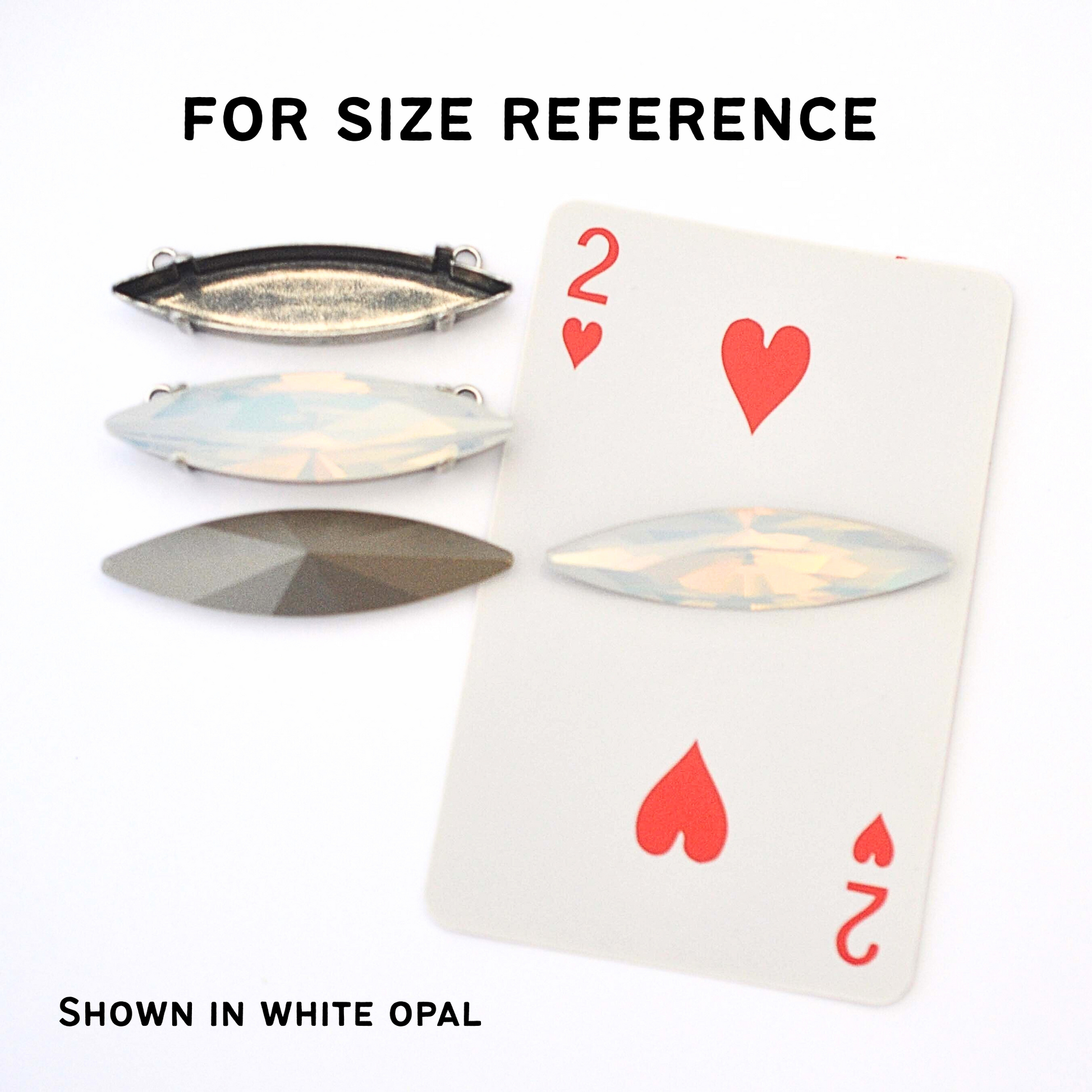 White opal navette crystal shown next to a standard size playing card for size reference, with front and back views. Text on image reads "For size reference" at the top and "Shown in white opal" at the bottom.