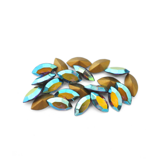 Navette shaped faceted Austrian crystal rhinestones in the color Amethyst AB displayed on a white background.