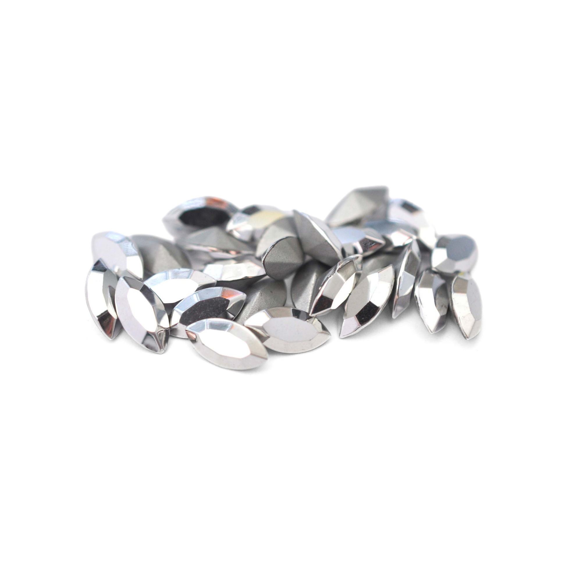 Navette shaped faceted Austrian crystal rhinestones in the color Comet Argent Light displayed on a white background.