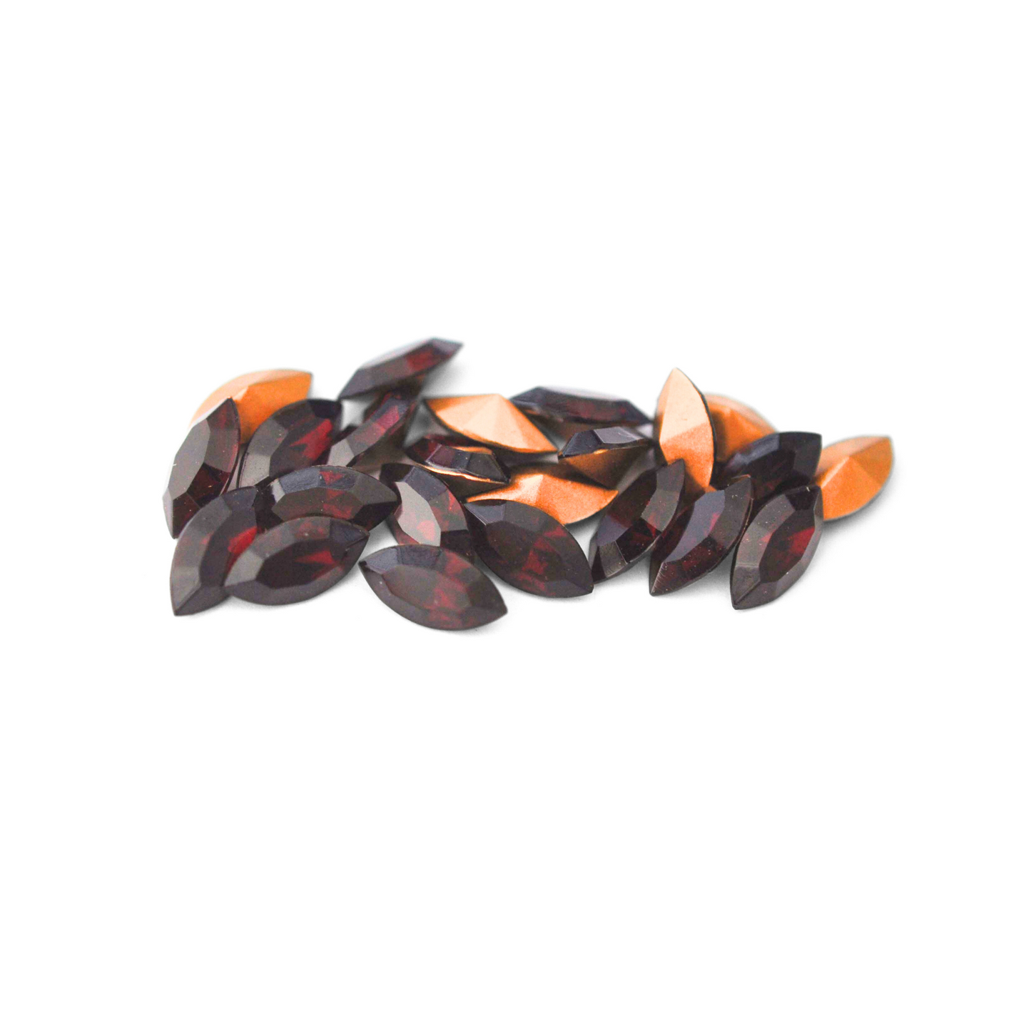 Navette shaped faceted Austrian crystal rhinestones in the color Garnet displayed on a white background.