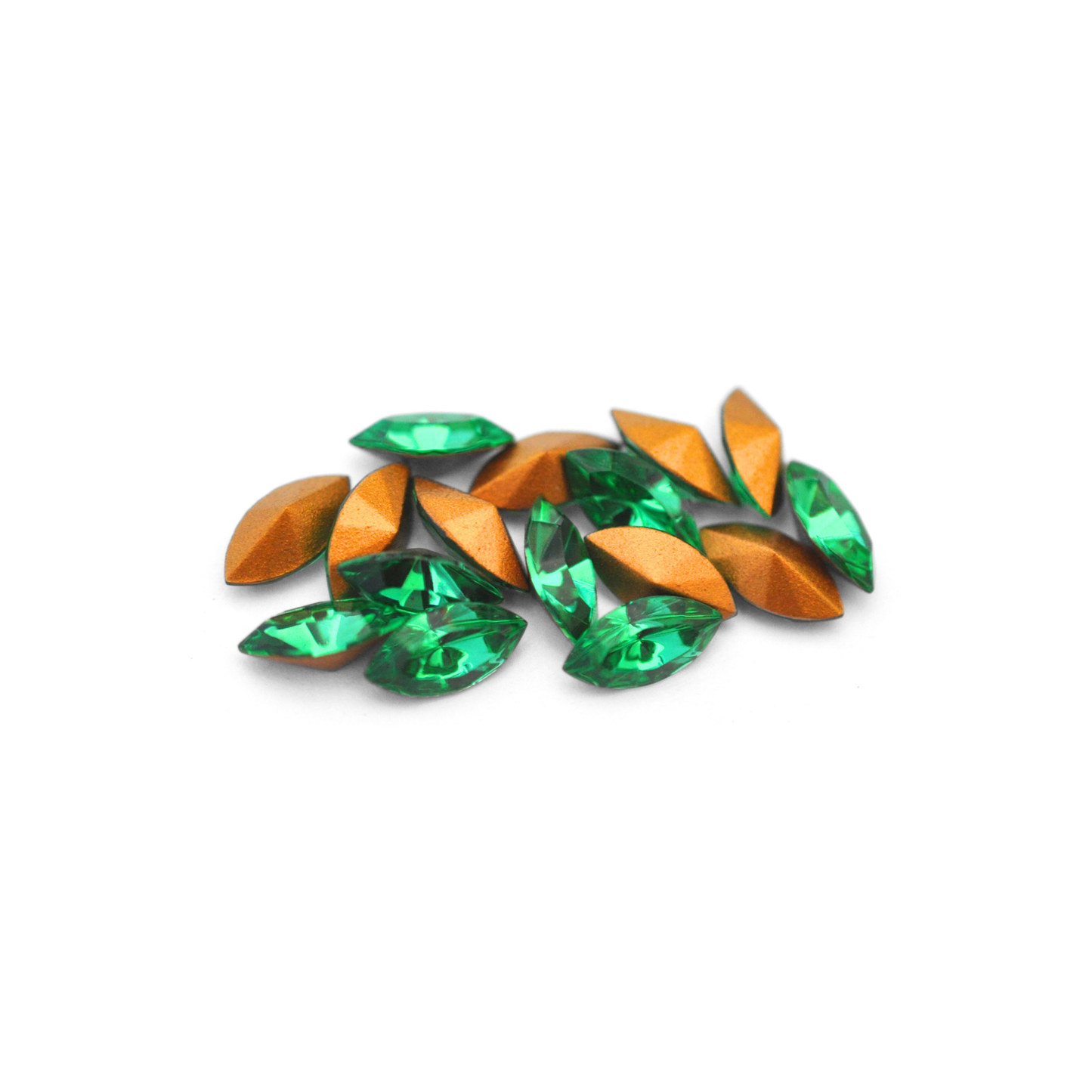Navette shaped faceted Austrian crystal rhinestones in the color Light Emerald displayed on a white background.
