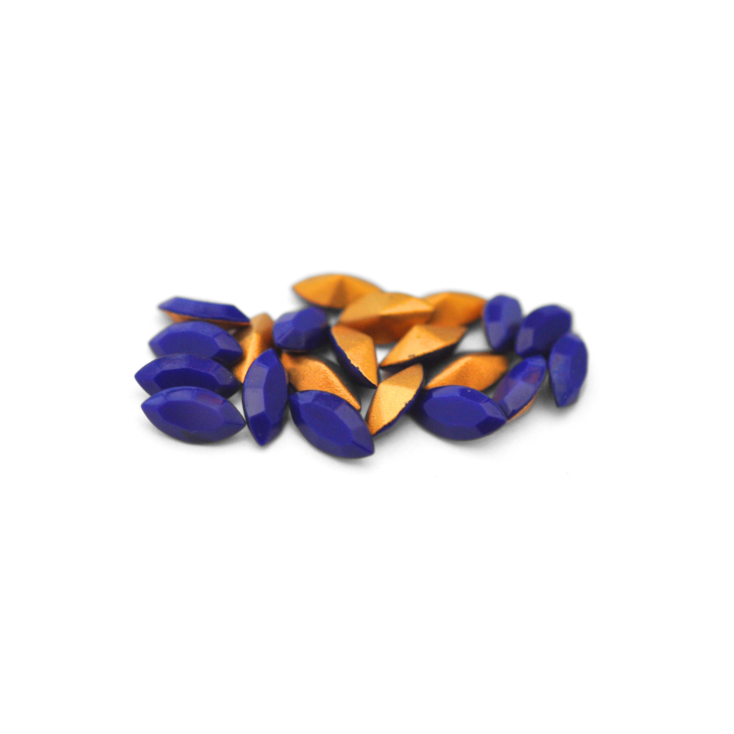 Navette shaped faceted Austrian crystal rhinestones in the color Navy Blue displayed on a white background.