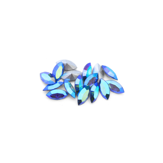Navette shaped faceted Austrian crystal rhinestones in the color Sapphire AB displayed on a white background.