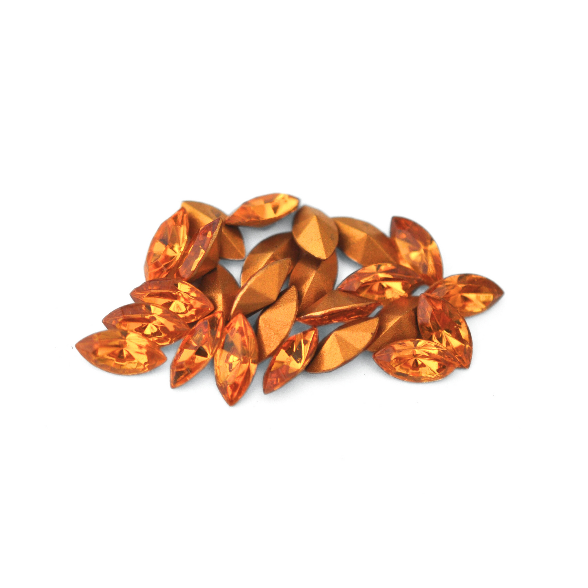 Navette shaped faceted Austrian crystal rhinestones in the color Topaz displayed on a white background.