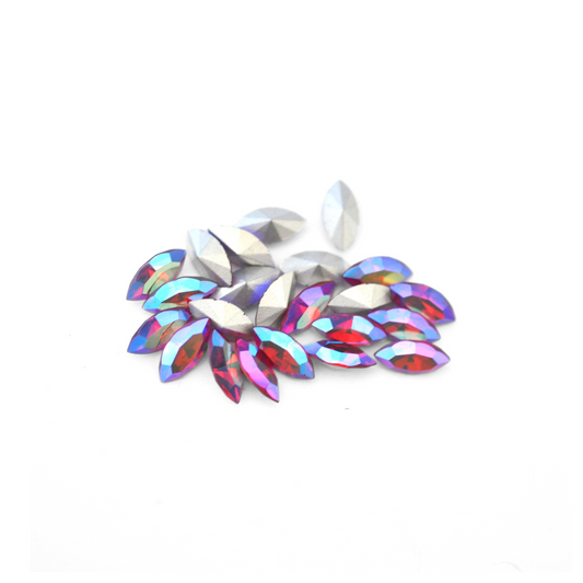 Navette shaped faceted Austrian crystal rhinestones in the color Light Siam AB displayed on a white background.
