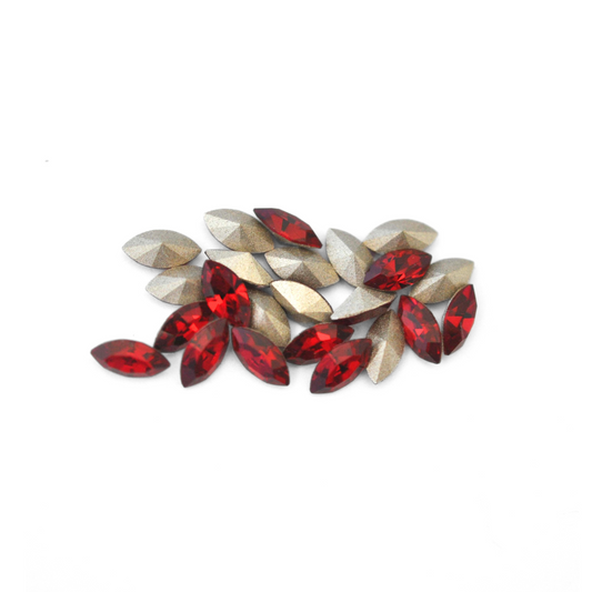 Navette shaped faceted Austrian crystal rhinestones in the color Siam displayed on a white background.