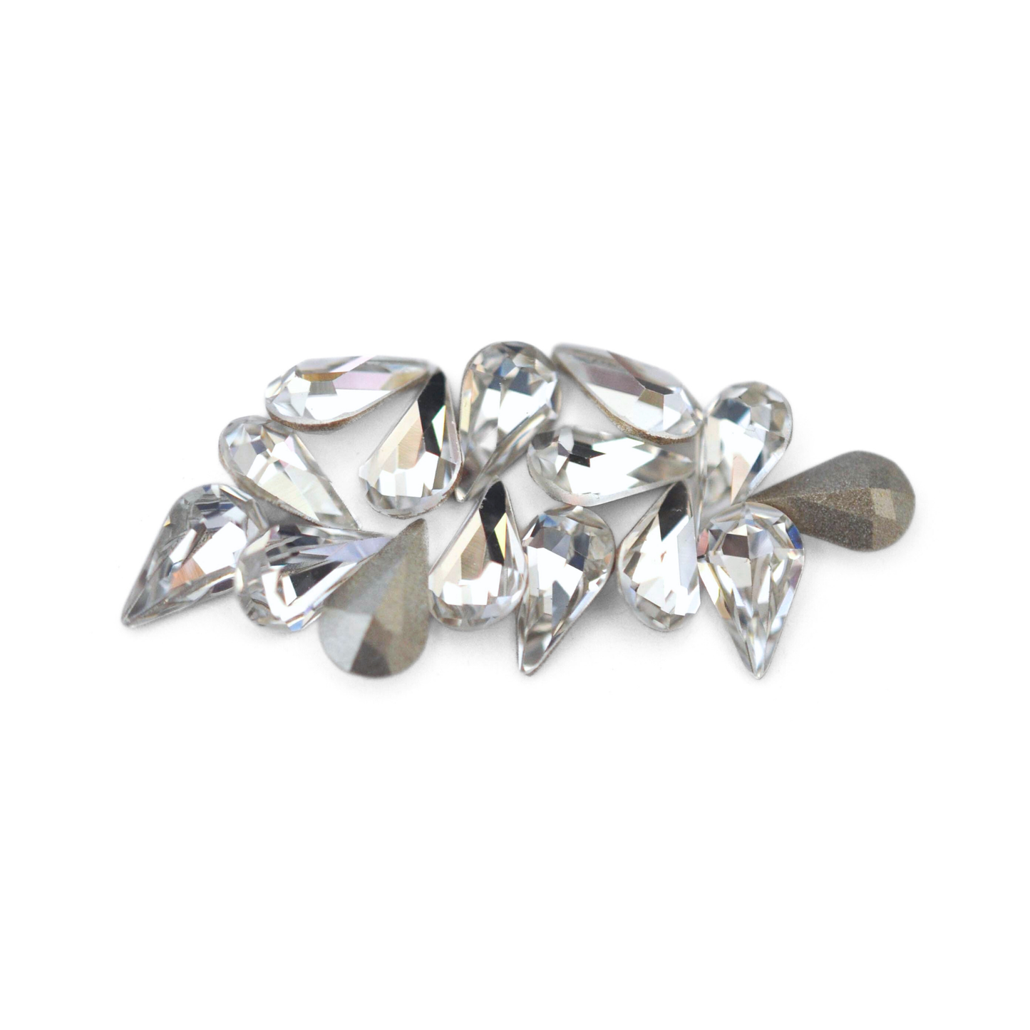Pear shaped faceted Austrian crystal rhinestones in the color Crystal displayed on a white background.