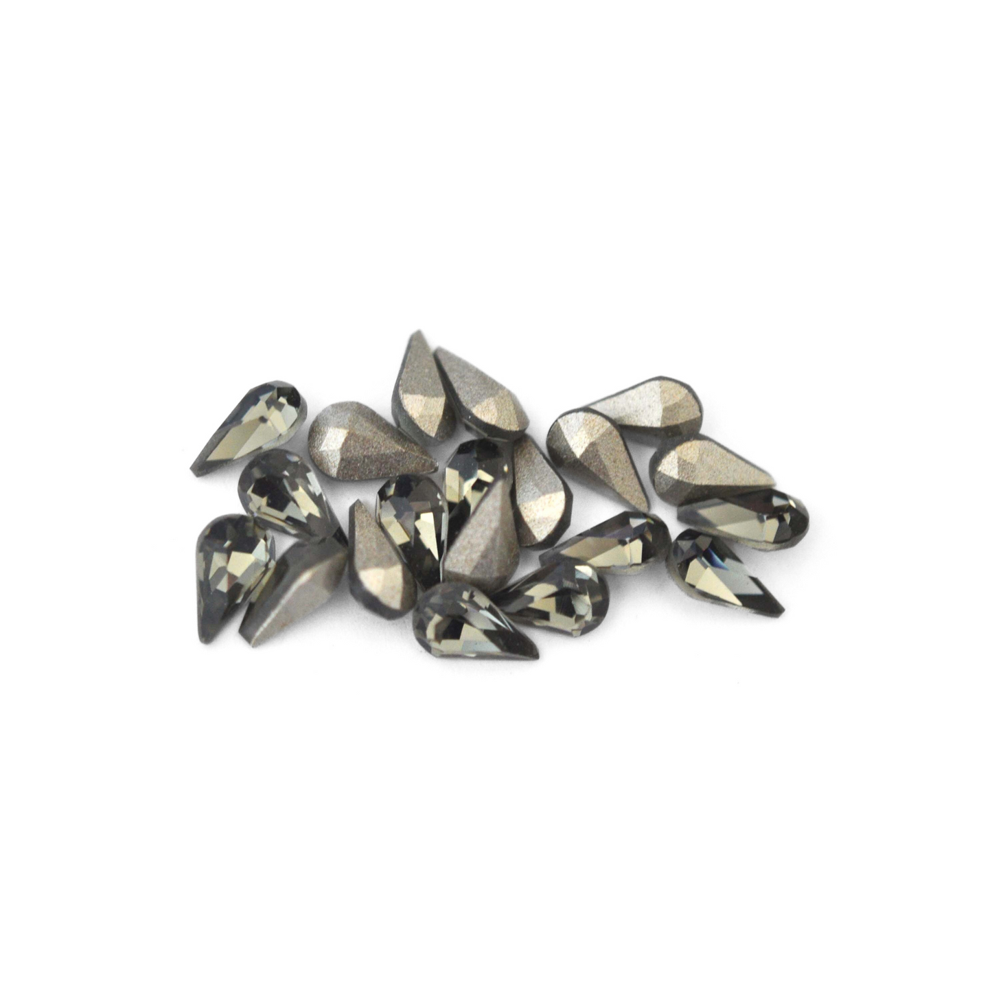 Pear shaped faceted Austrian crystal rhinestones in the color Black Diamond displayed on a white background.