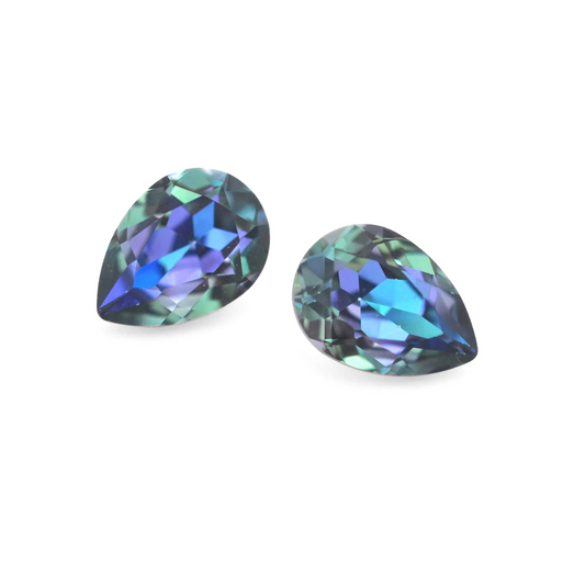 Pear shape faceted Austrian crystal rhinestones in the color Aqua Vitrail Light displayed on a white background.