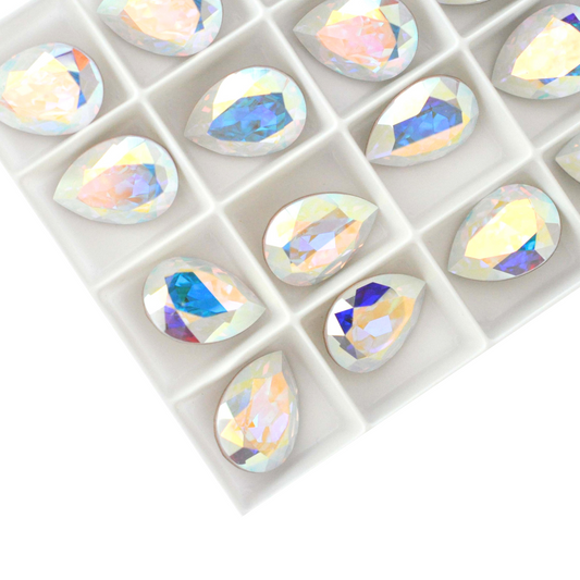 Pear shape faceted Austrian crystal rhinestones in the color Crystal AB displayed on a white background.