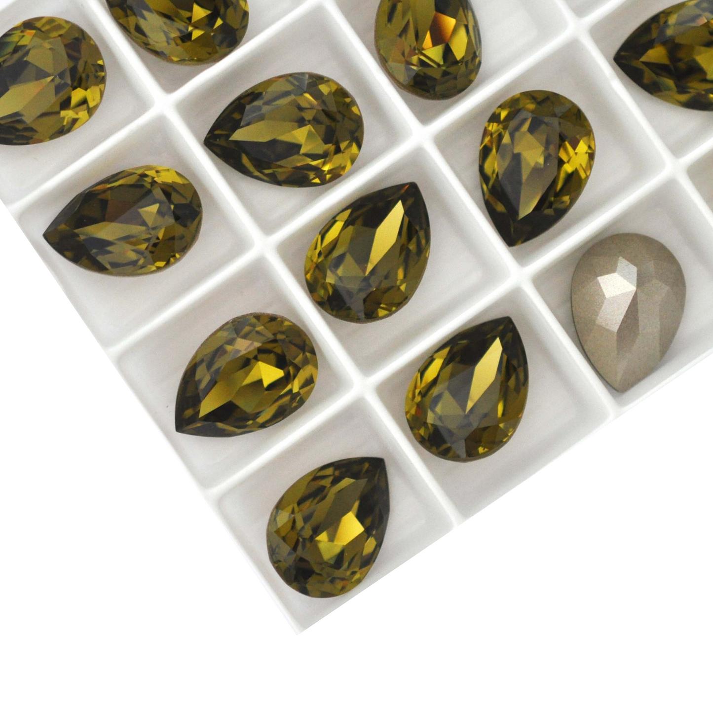 Pear shape faceted Austrian crystal rhinestones in the color Khaki displayed on a white background.