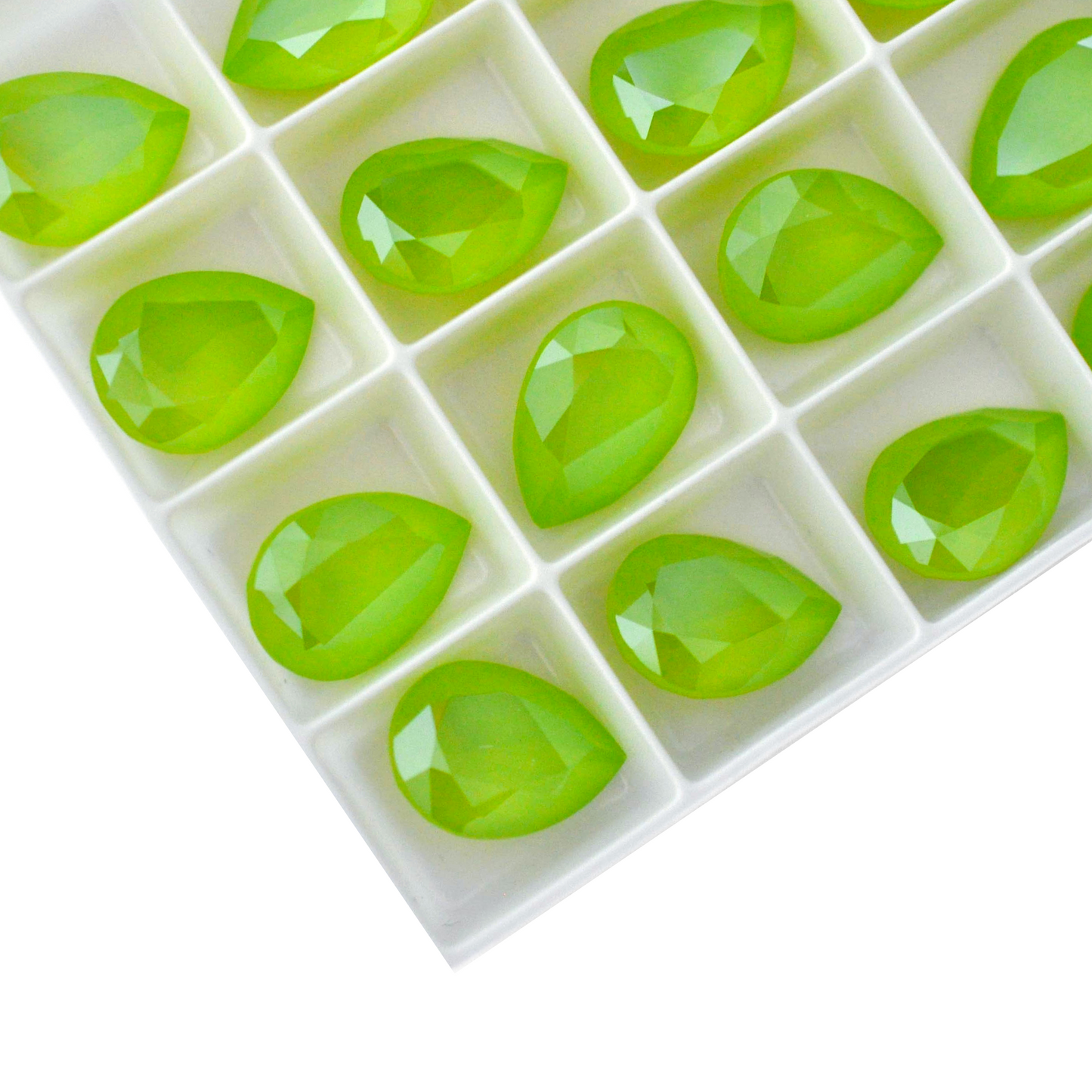 Pear shape faceted Austrian crystal rhinestones in the color Lime Lacquer displayed on a white background.