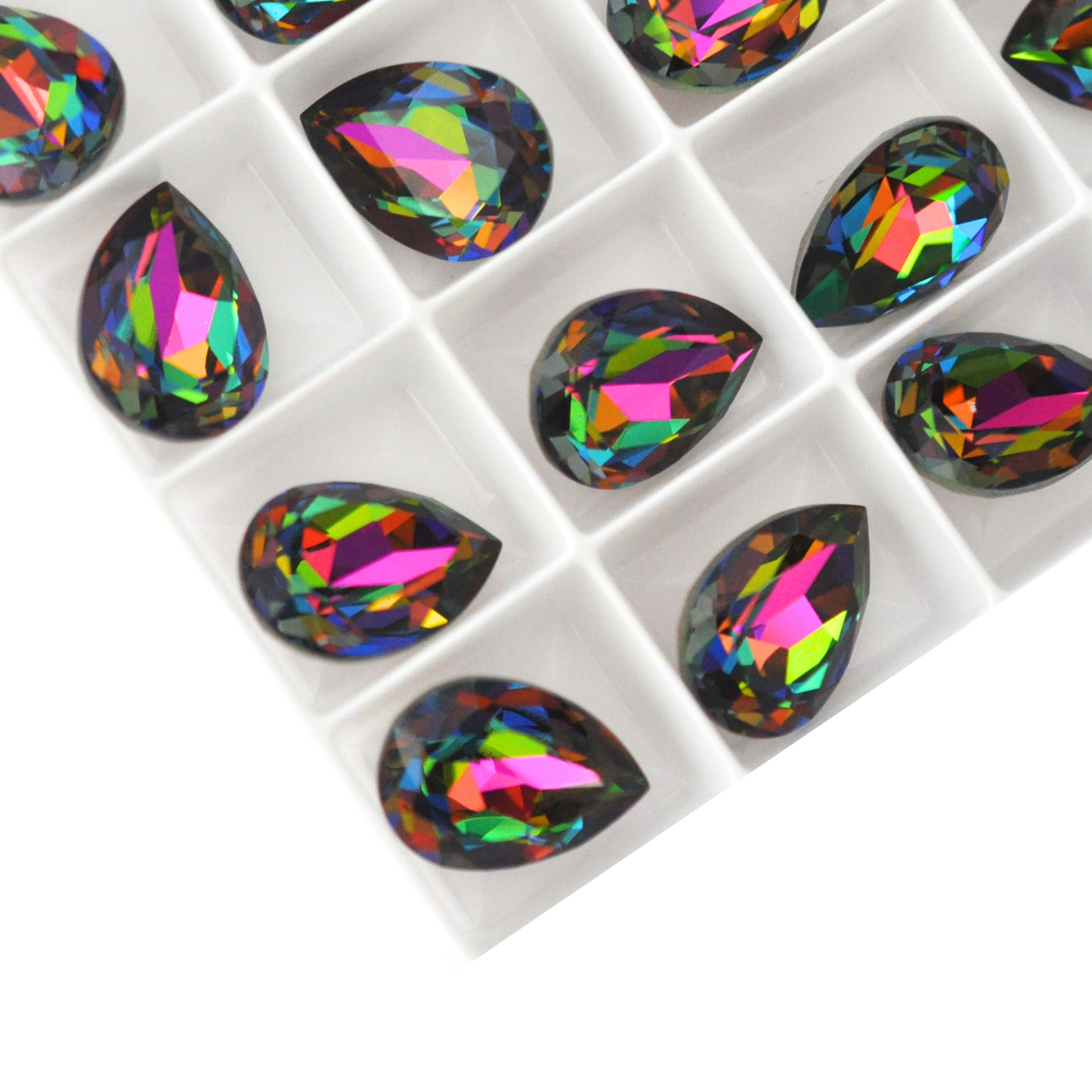 Pear shape faceted Austrian crystal rhinestones in the color Vitrail Medium displayed on a white background.