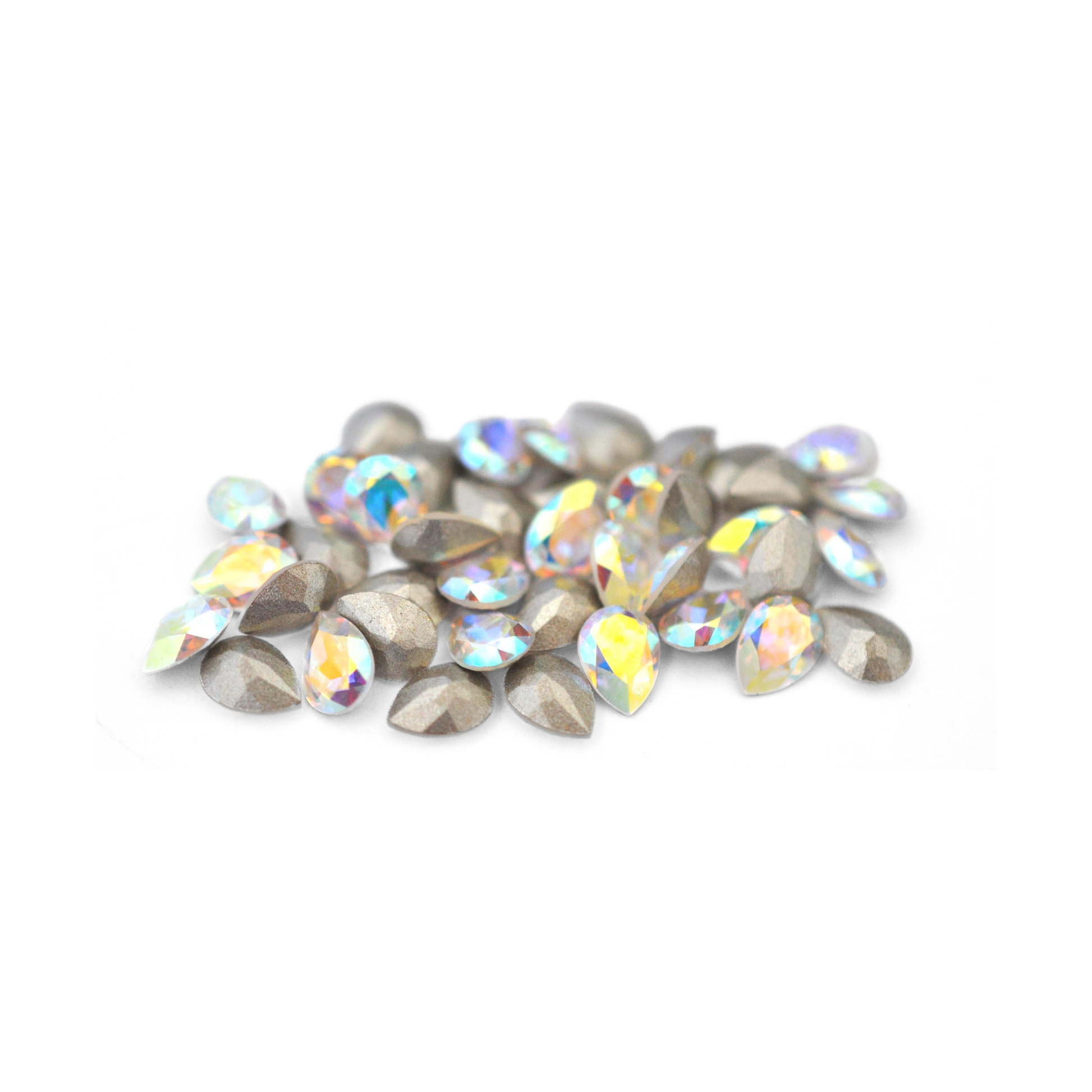 Pear shaped faceted Austrian crystal rhinestones in the color Crystal AB displayed on a white background.
