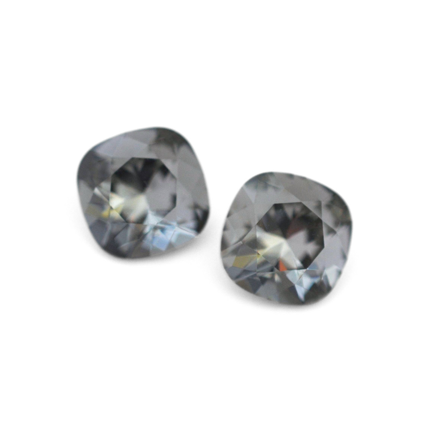 Cushion Square faceted Austrian crystal rhinestones in the color Black Diamond displayed on a white background.
