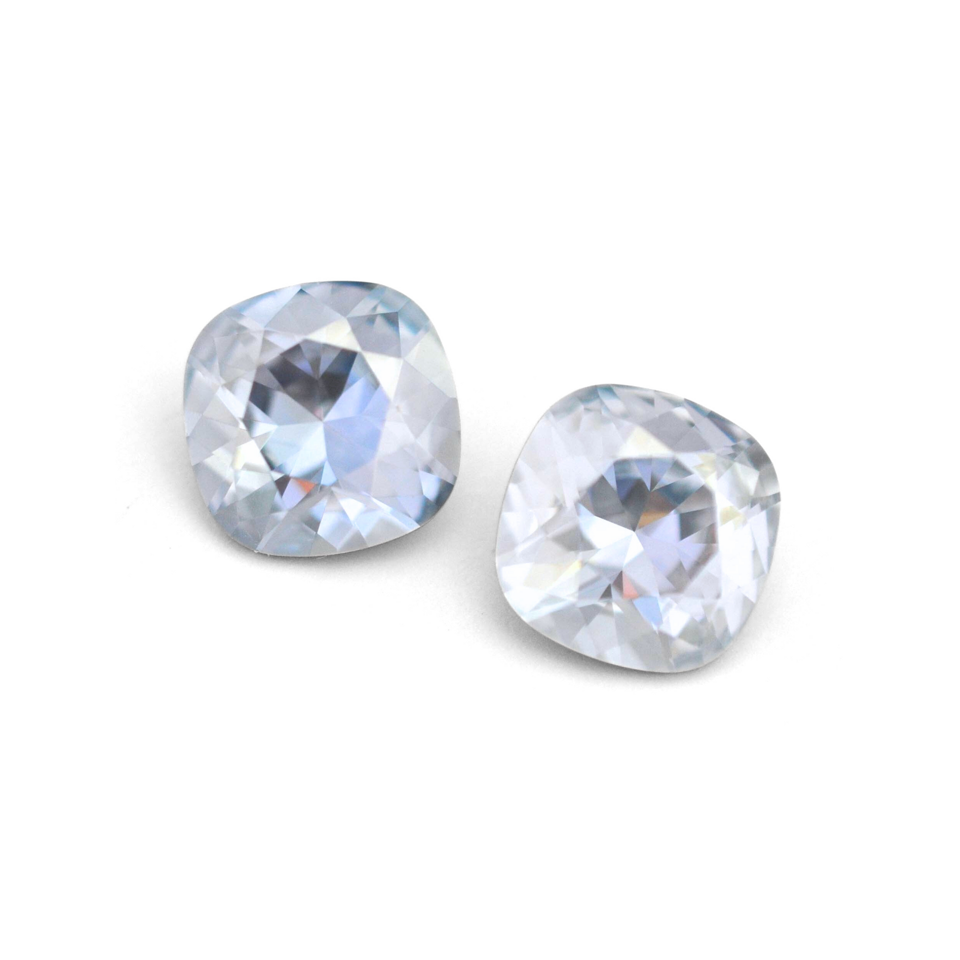 Cushion Square faceted Austrian crystal rhinestones in the color Blue Shade displayed on a white background.
