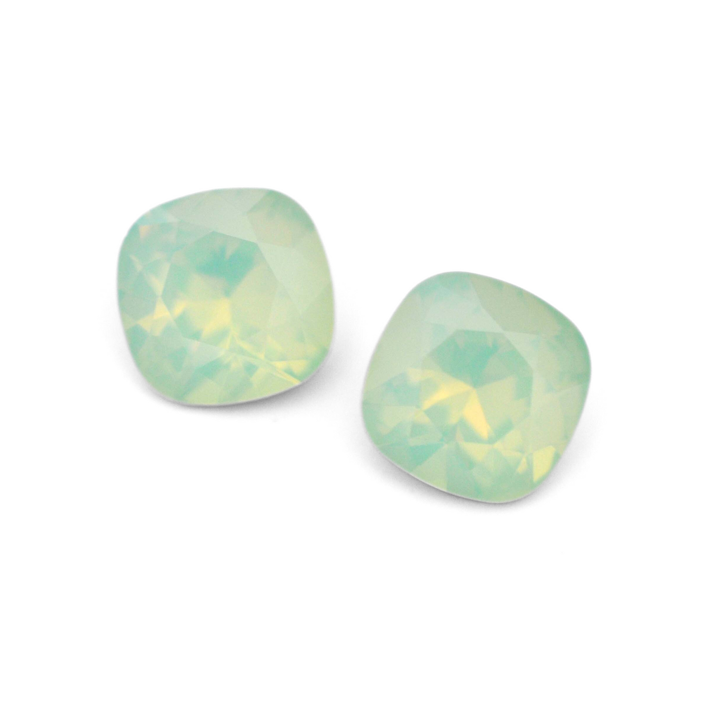 Cushion Square faceted Austrian crystal rhinestones in the color Chrysolite Opal displayed on a white background.