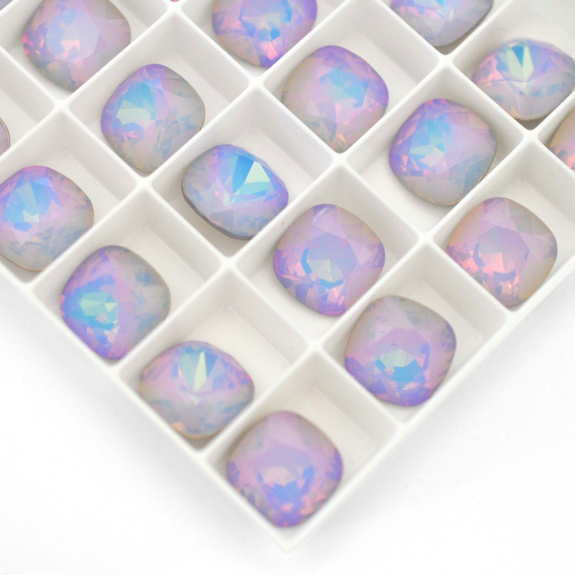 Cushion Square faceted Austrian crystal rhinestones in the color Dreamy Vitrail displayed on a white background.