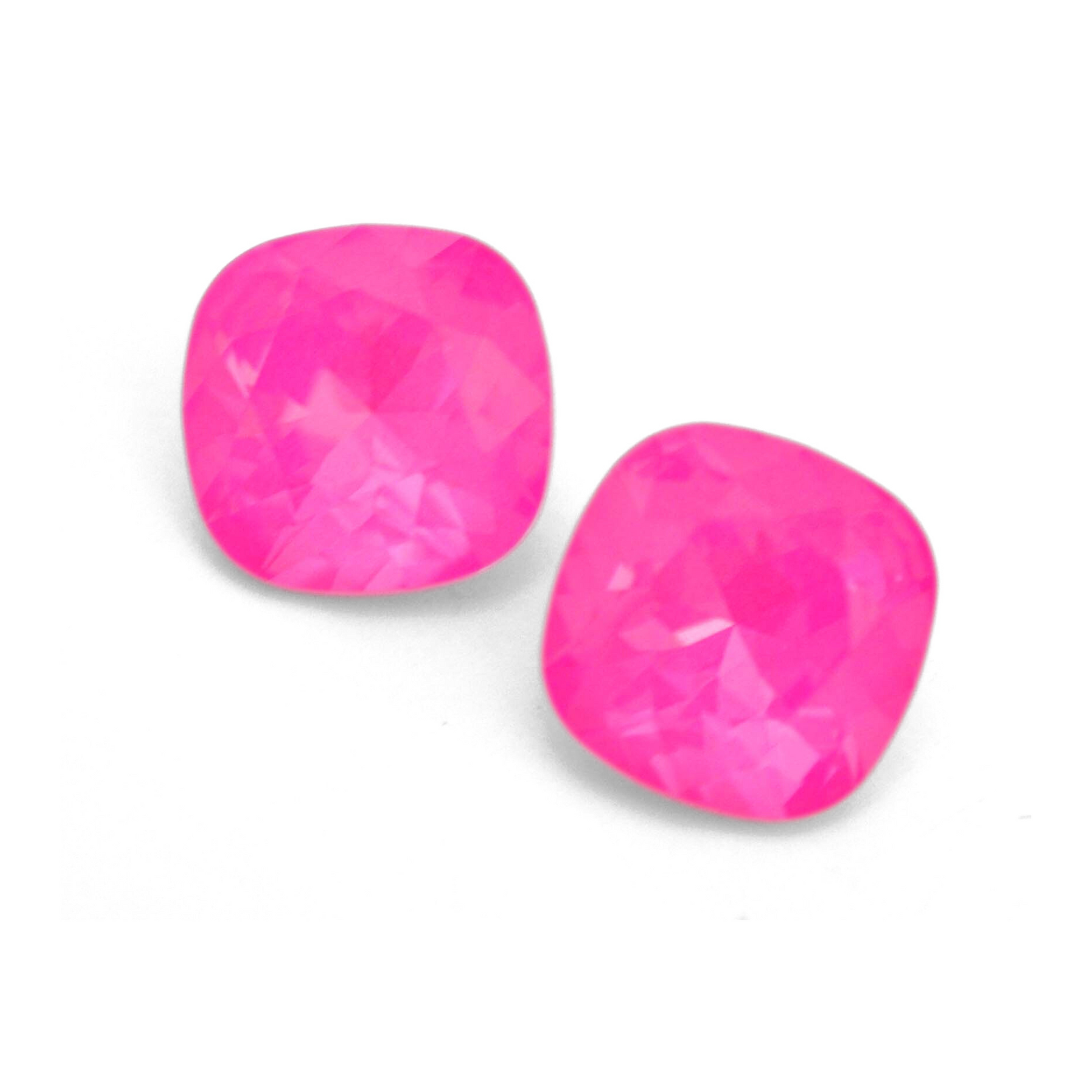 Cushion Square faceted Austrian crystal rhinestones in the color Electric Pink Ignite displayed on a white background.