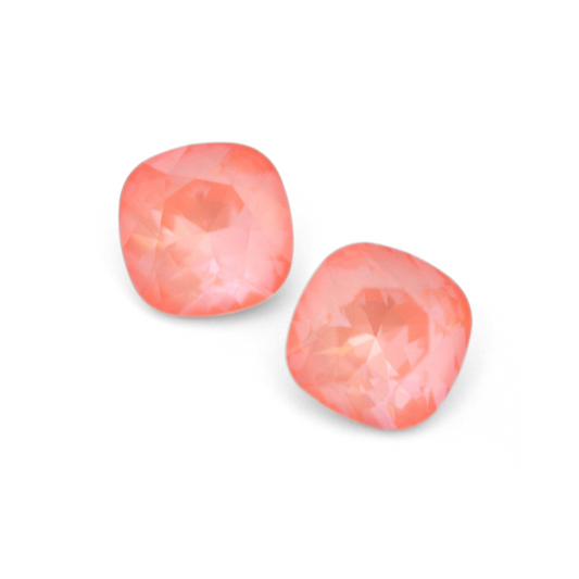 Cushion Square faceted Austrian crystal rhinestones in the color Flamingo Ignite displayed on a white background.