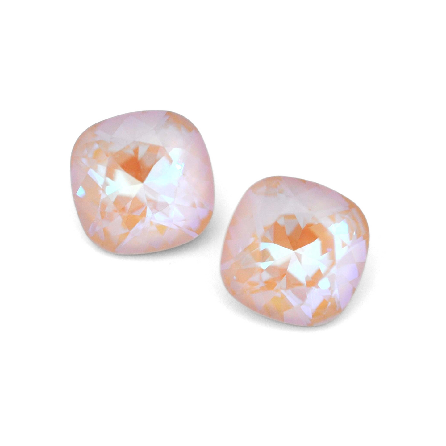 Cushion Square faceted Austrian crystal rhinestones in the color Ivory Cream Delite displayed on a white background.