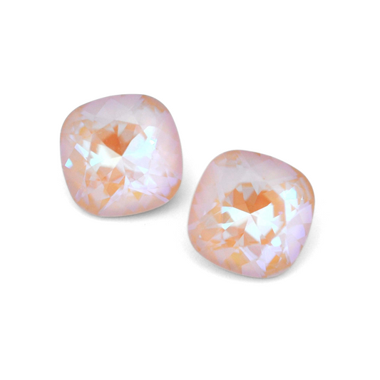 Cushion Square faceted Austrian crystal rhinestones in the color Ivory Cream Delite displayed on a white background.