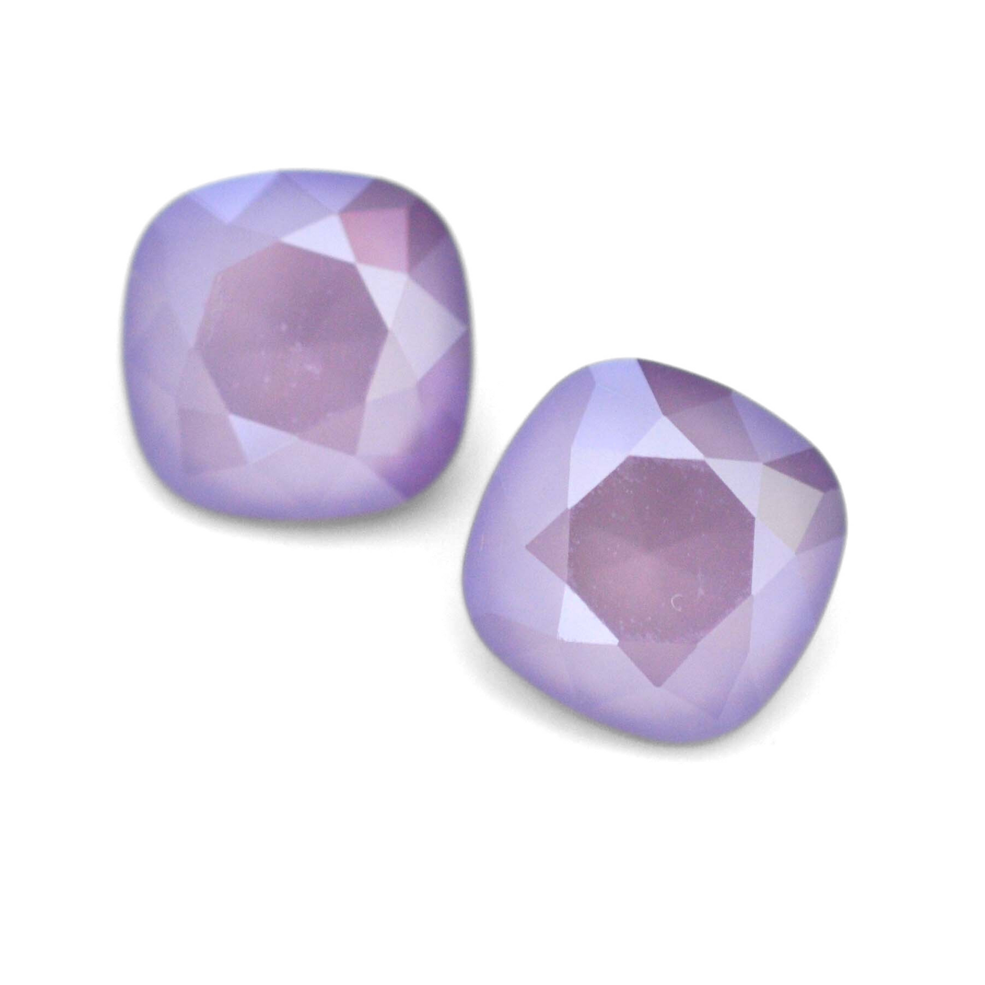 Cushion Square faceted Austrian crystal rhinestones in the color Lilac displayed on a white background.