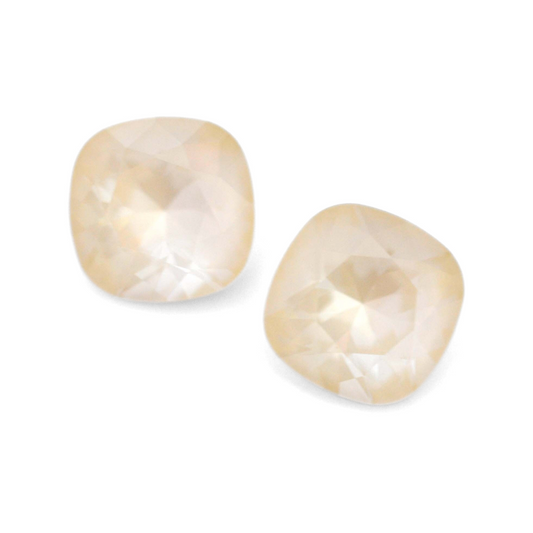 Cushion Square faceted Austrian crystal rhinestones in the color Linen Ignite displayed on a white background.