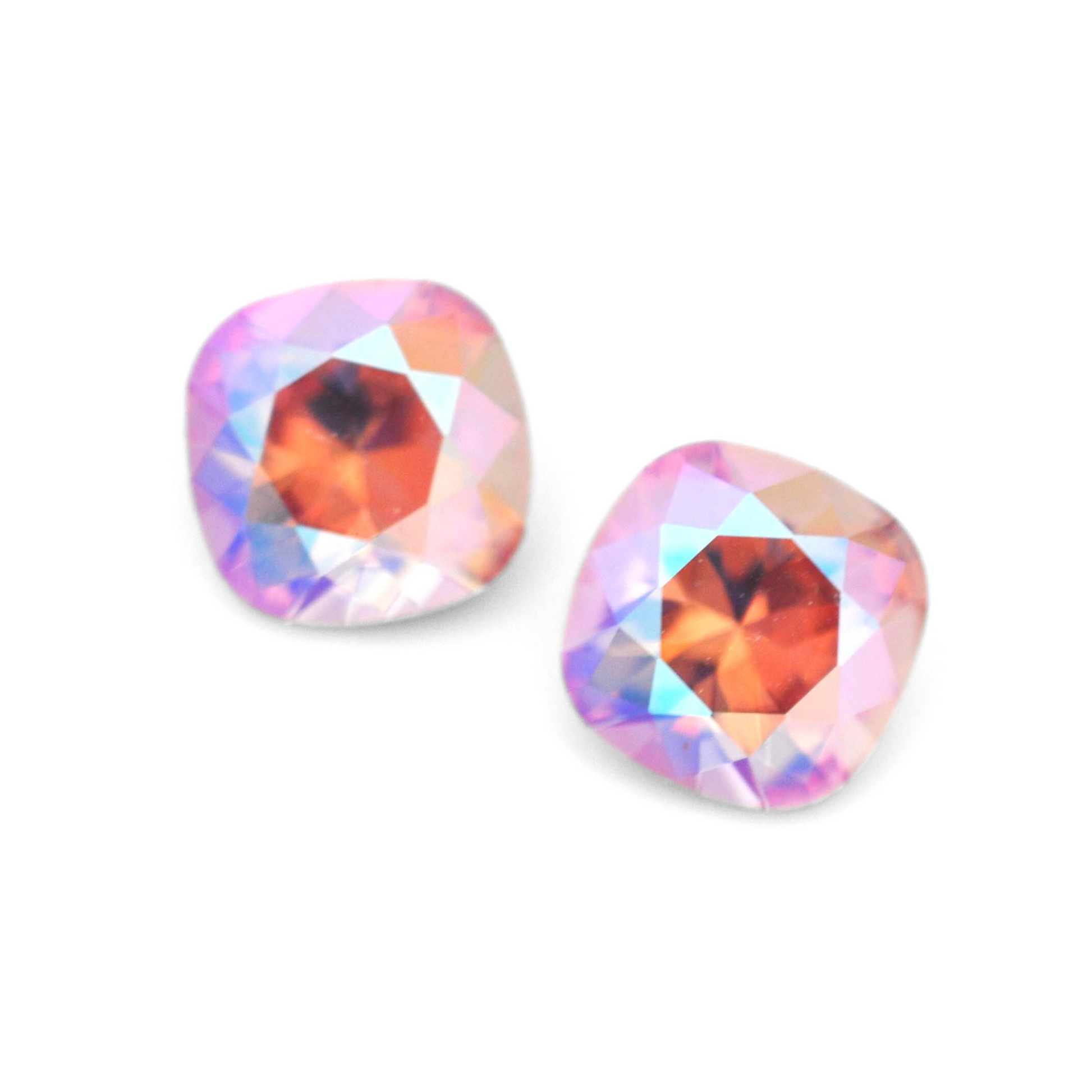 Cushion Square faceted Austrian crystal rhinestones in the color Light Rose Shimmer displayed on a white background.