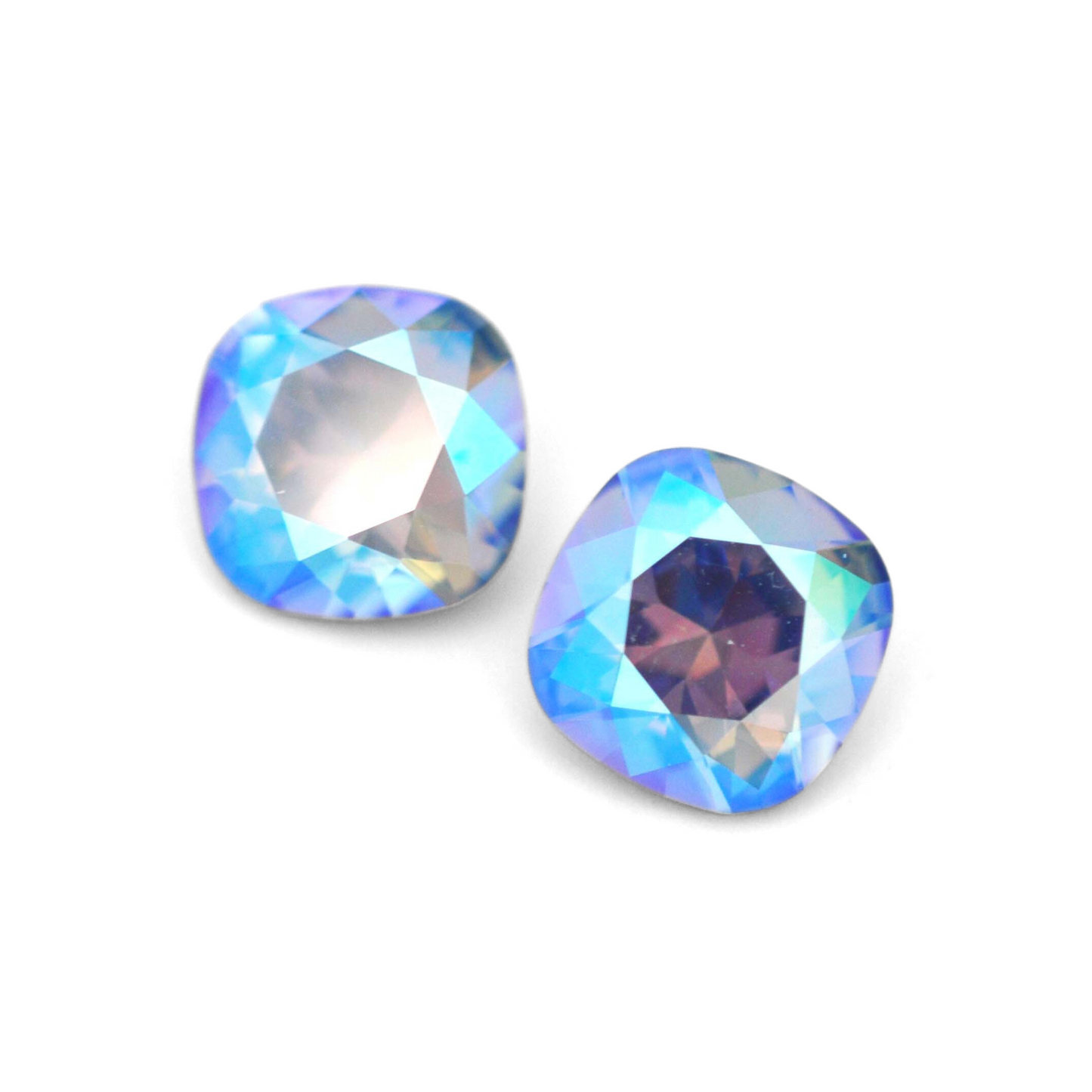 Cushion Square faceted Austrian crystal rhinestones in the color Light Sapphire Shimmer displayed on a white background.