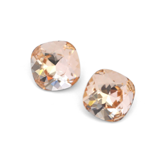 Cushion Square faceted Austrian crystal rhinestones in the color Light Silk displayed on a white background.