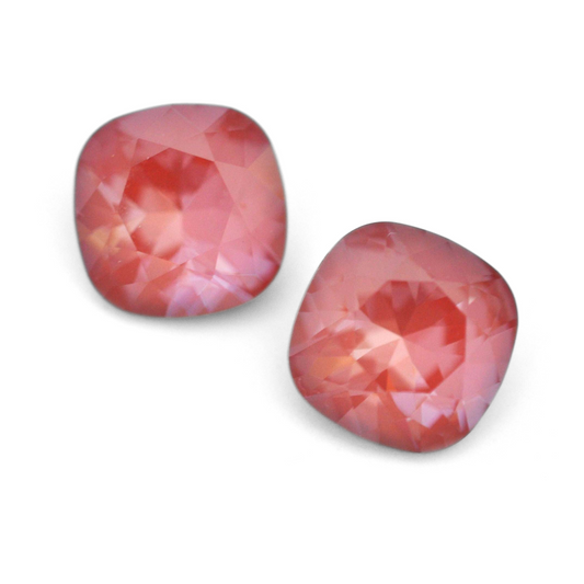 Cushion Square faceted Austrian crystal rhinestones in the color Maroon Ignite displayed on a white background.