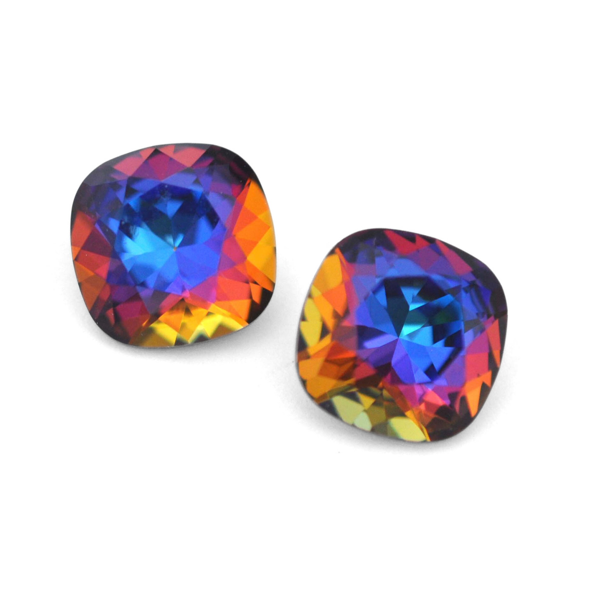 Cushion Square faceted Austrian crystal rhinestones in the color Meridian Blue displayed on a white background.