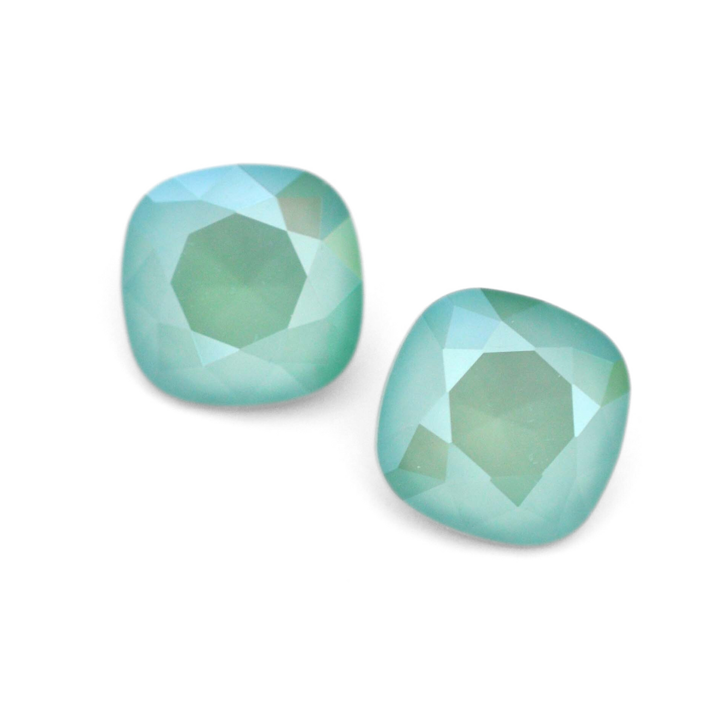 Cushion Square faceted Austrian crystal rhinestones in the color Mint Green displayed on a white background.
