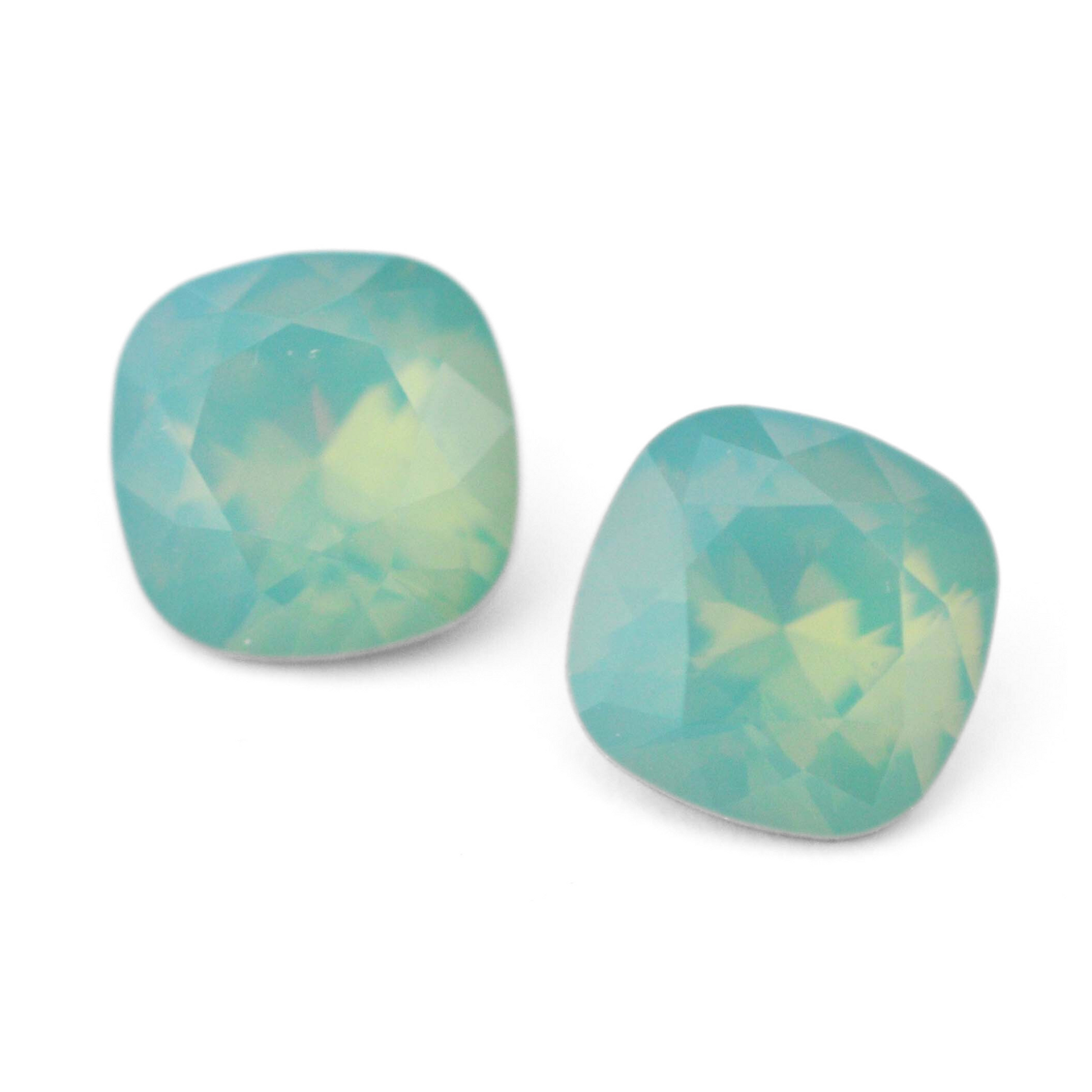 Cushion Square faceted Austrian crystal rhinestones in the color Pacific Opal displayed on a white background.