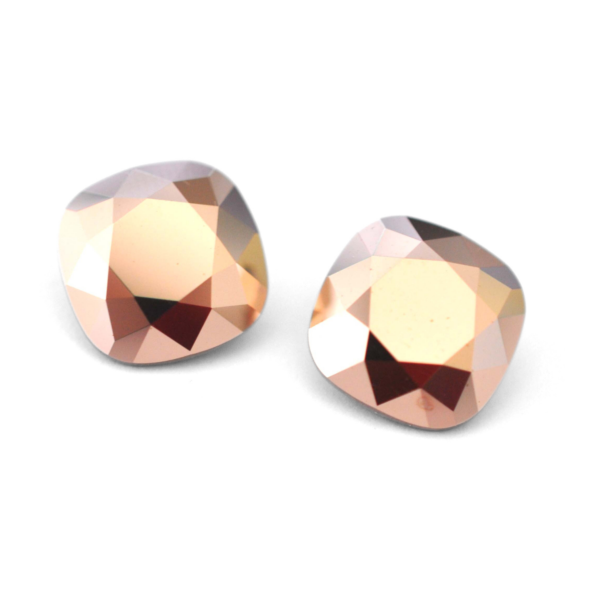 Cushion Square faceted Austrian crystal rhinestones in the color Rose Gold displayed on a white background.