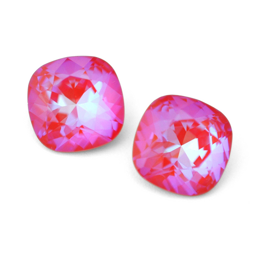 Cushion Square faceted Austrian crystal rhinestones in the color Royal Red Delite displayed on a white background.