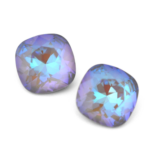 Cushion Square faceted Austrian crystal rhinestones in the color Serene Grey Delite displayed on a white background.