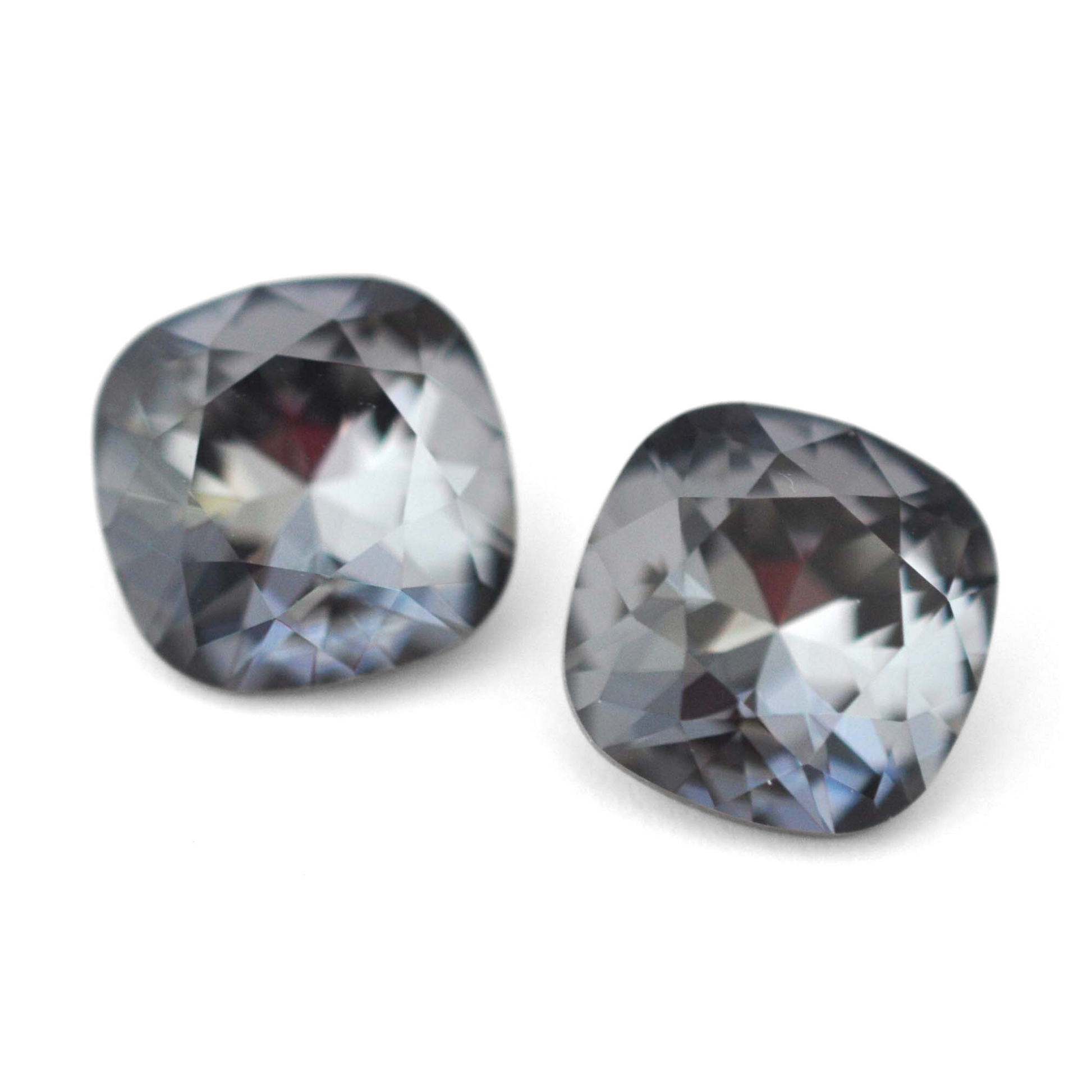 Cushion Square faceted Austrian crystal rhinestones in the color Silver Night displayed on a white background.