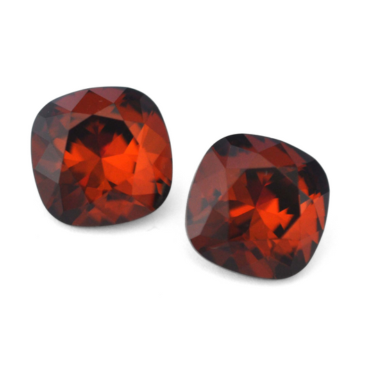 Cushion Square faceted Austrian crystal rhinestones in the color Smoked Amber displayed on a white background.