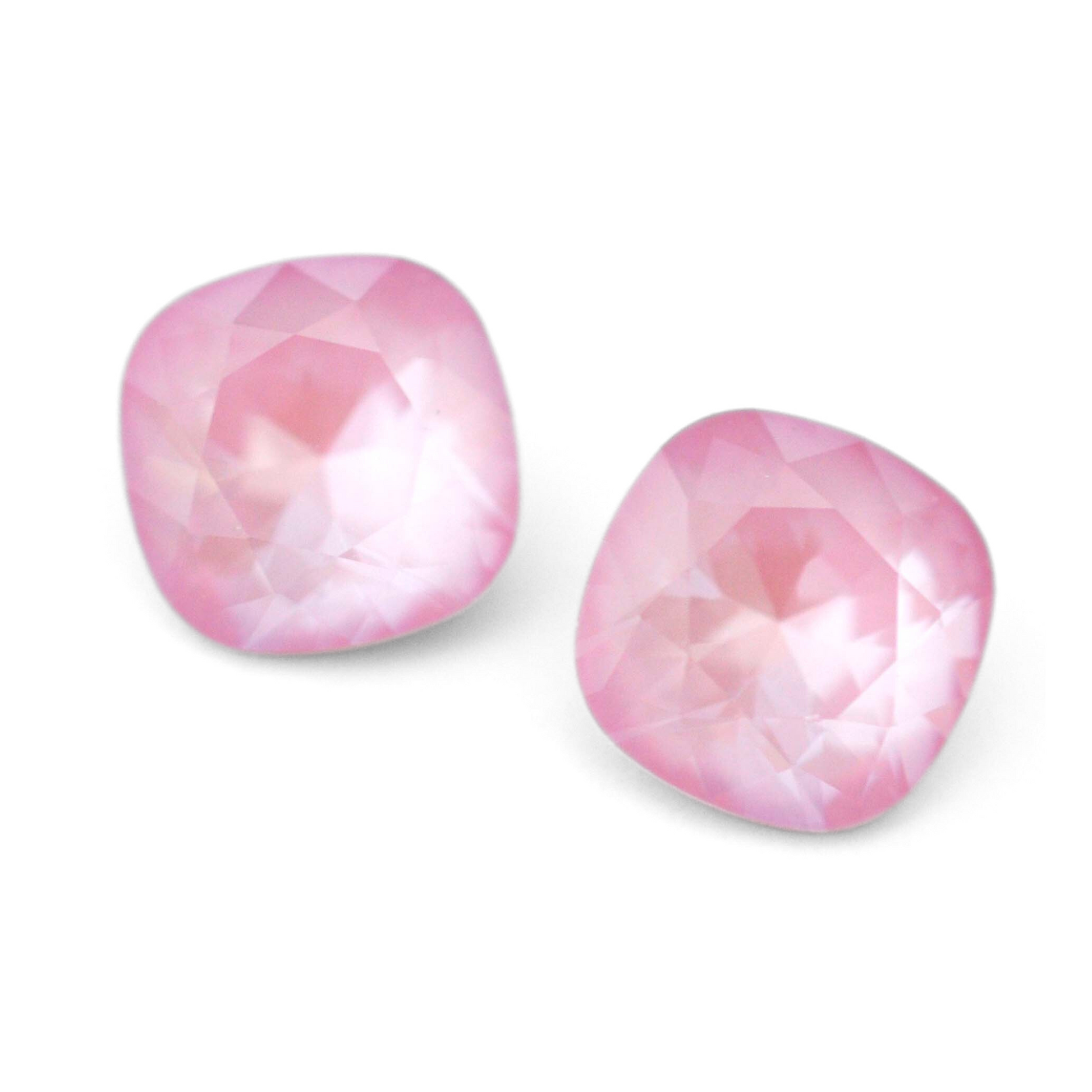 Cushion Square faceted Austrian crystal rhinestones in the color Soft Rose Ignite displayed on a white background.