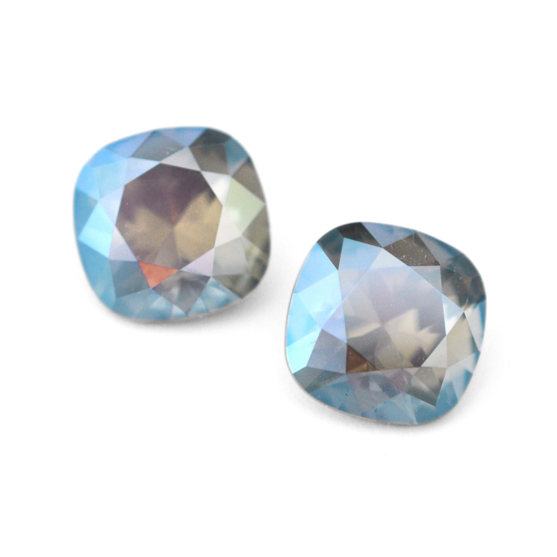 Cushion Square faceted Austrian crystal rhinestones in the color Stormy displayed on a white background.