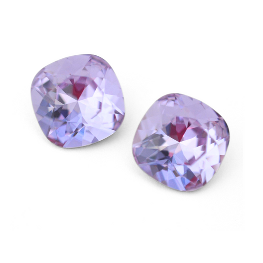Cushion Square faceted Austrian crystal rhinestones in the color Violet displayed on a white background.