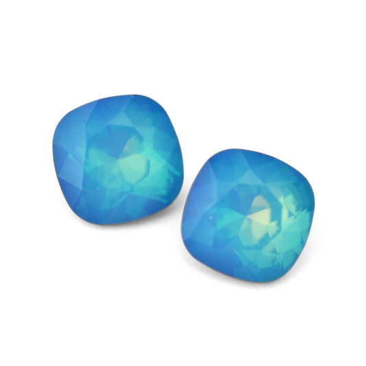 Cushion Square faceted Austrian crystal rhinestones in the color White Opal Star Shine displayed on a white background.