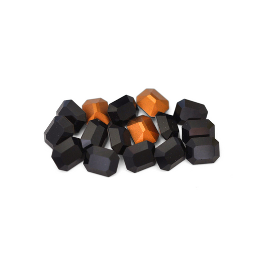 Octagon shaped faceted Austrian crystal rhinestones in the color Jet displayed on a white background.