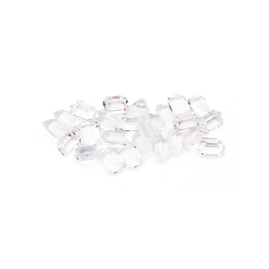Octagon shaped faceted Austrian crystal rhinestones in the color Crystal displayed on a white background.