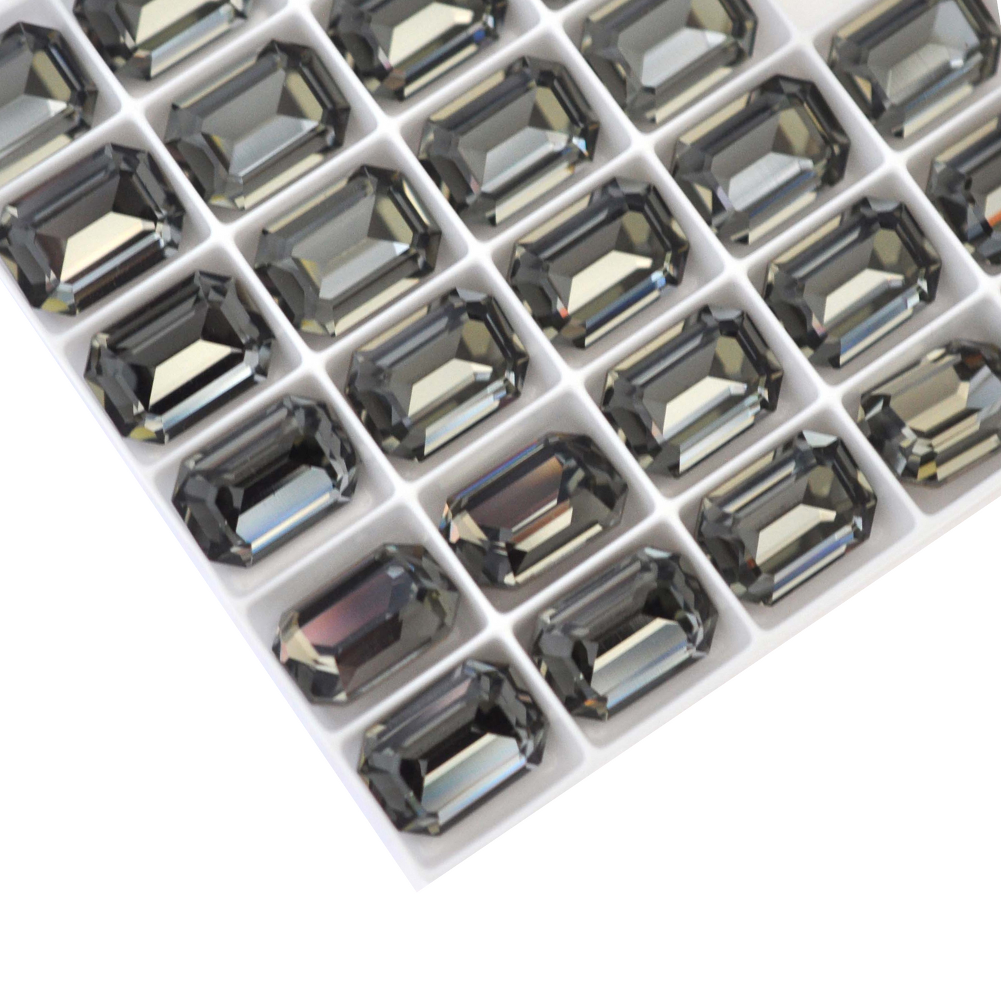 Octagon shaped faceted Austrian crystal rhinestones in the color Black Diamond displayed on a white background.